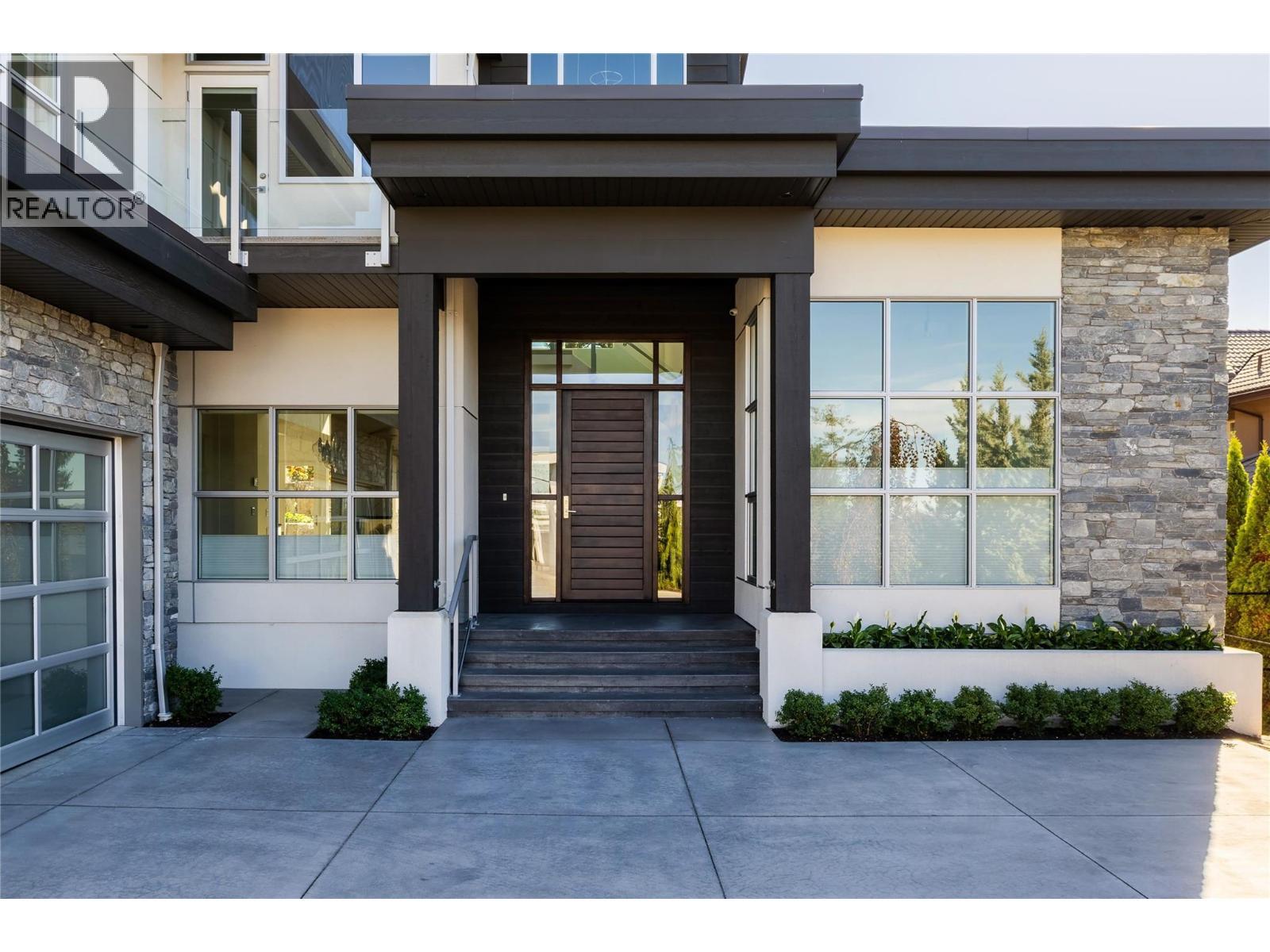 1049 Westpoint Drive, Kelowna, BC - Outdoor With Facade