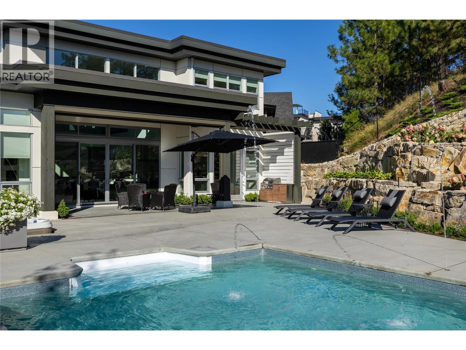 1049 Westpoint Drive, Kelowna, BC - Outdoor With In Ground Pool