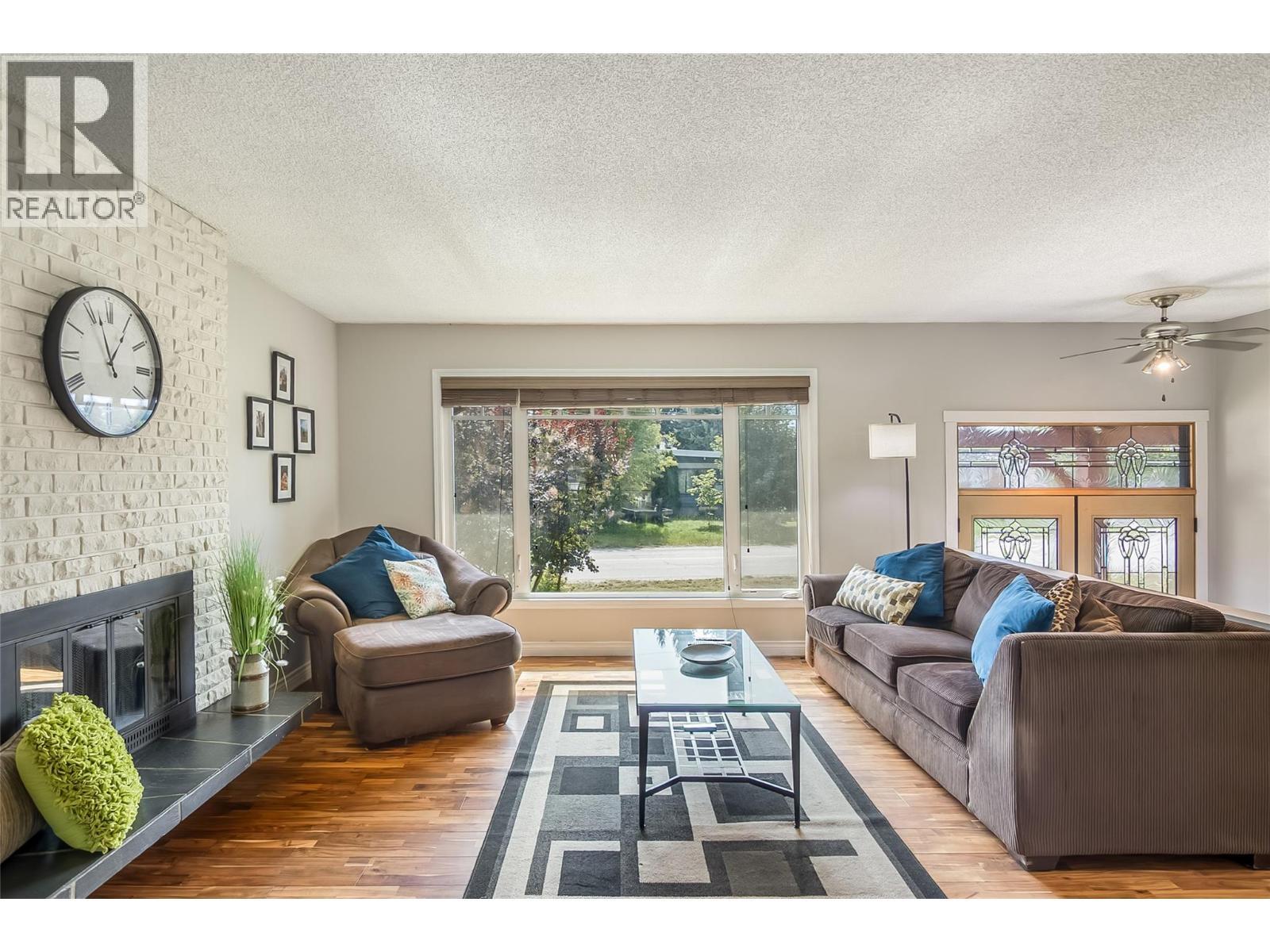 Living room main - 1824 Colbeck Road, Revelstoke, BC - Indoor Photo Showing Living Room With Fireplace