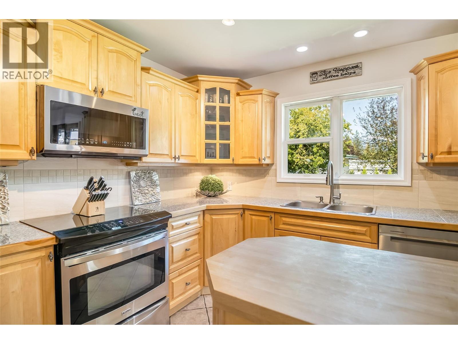1824 Colbeck Road, Revelstoke, BC - Indoor Photo Showing Kitchen With Double Sink