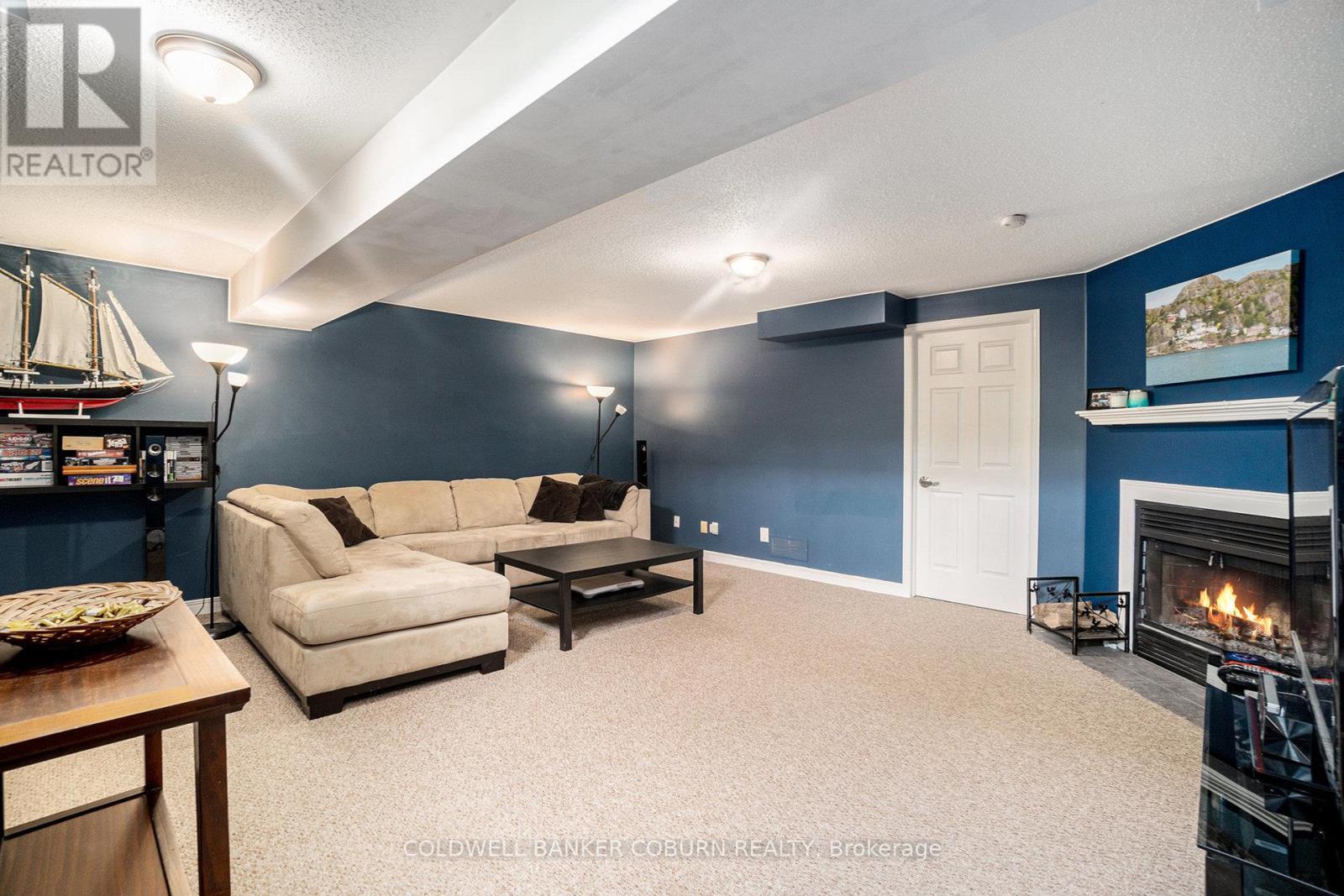 52 Blackdome Crescent, Ottawa, ON - Indoor Photo Showing Living Room With Fireplace