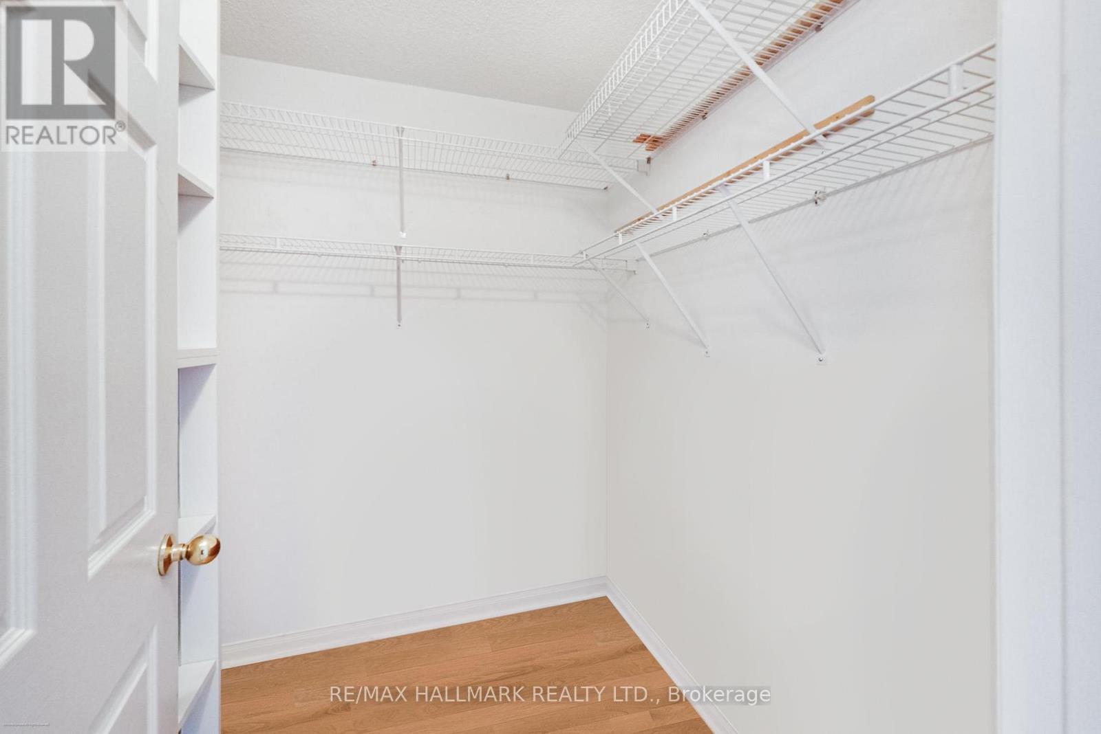 Kitchen - 702 - 5 Emerald Lane, Vaughan, ON - Indoor With Storage