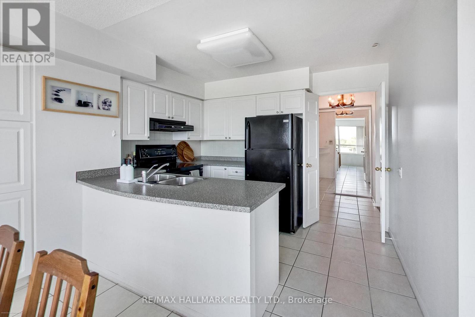Living Room - 702 - 5 Emerald Lane, Vaughan, ON - Indoor Photo Showing Kitchen With Double Sink