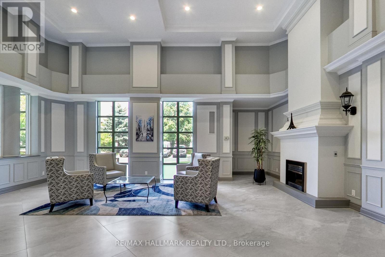 Primary Walk-In-Closet - 702 - 5 Emerald Lane, Vaughan, ON - Indoor With Fireplace