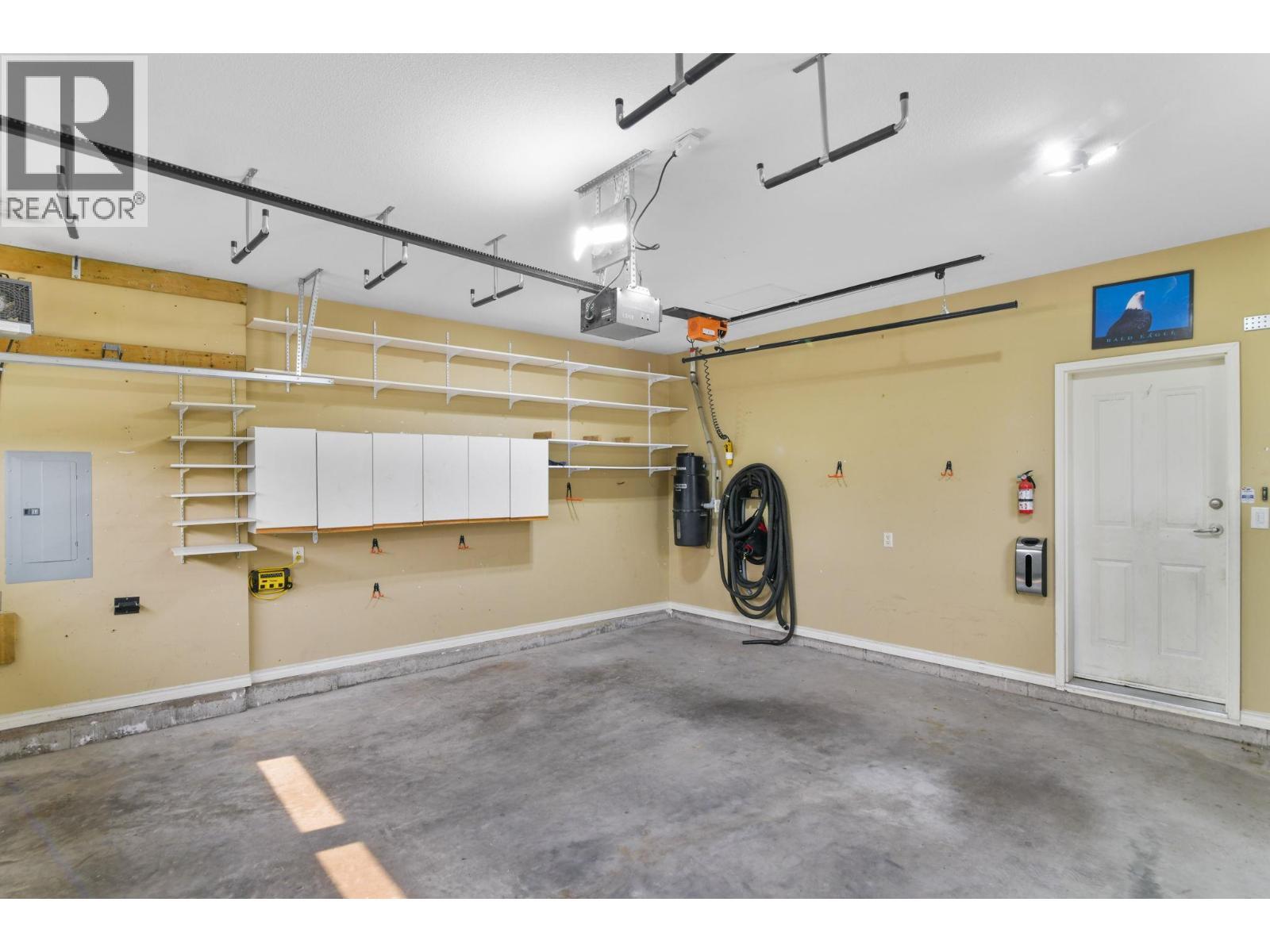 double garage - 2365 Stillingfleet Road Unit# 39, Kelowna, BC - Indoor Photo Showing Garage