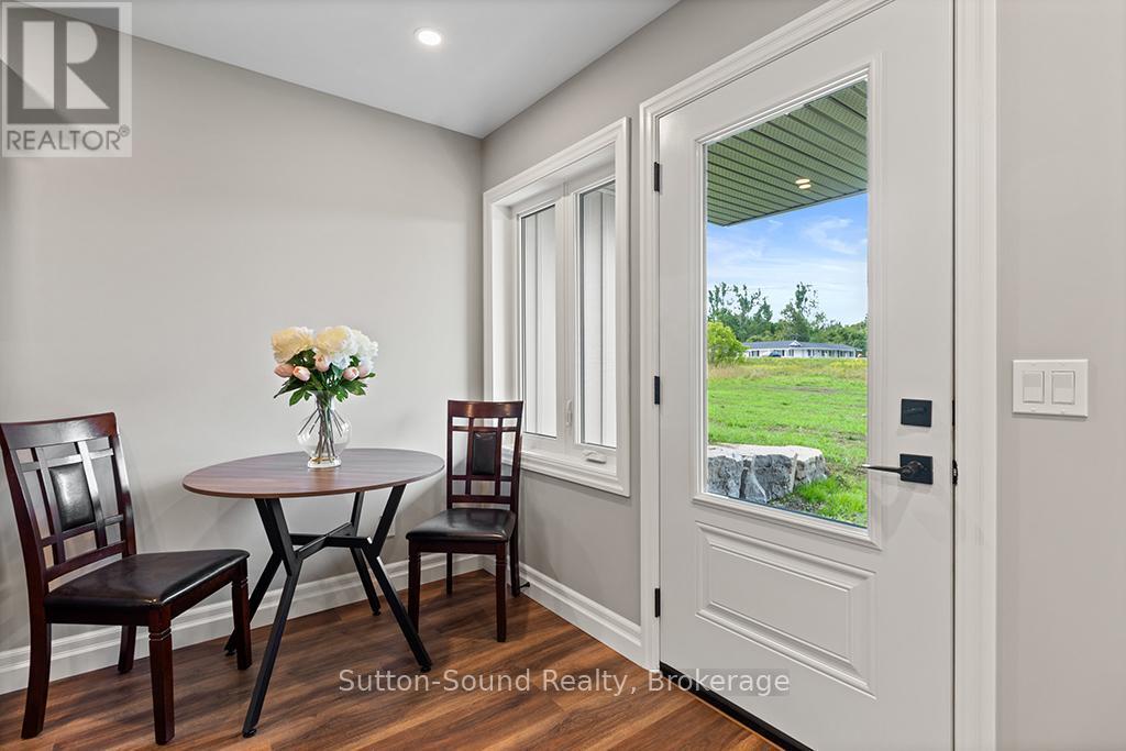 Walk out to backyard - 3 - 18 Maple Golf Crescent, Northern Bruce Peninsula, ON - Indoor Photo Showing Other Room