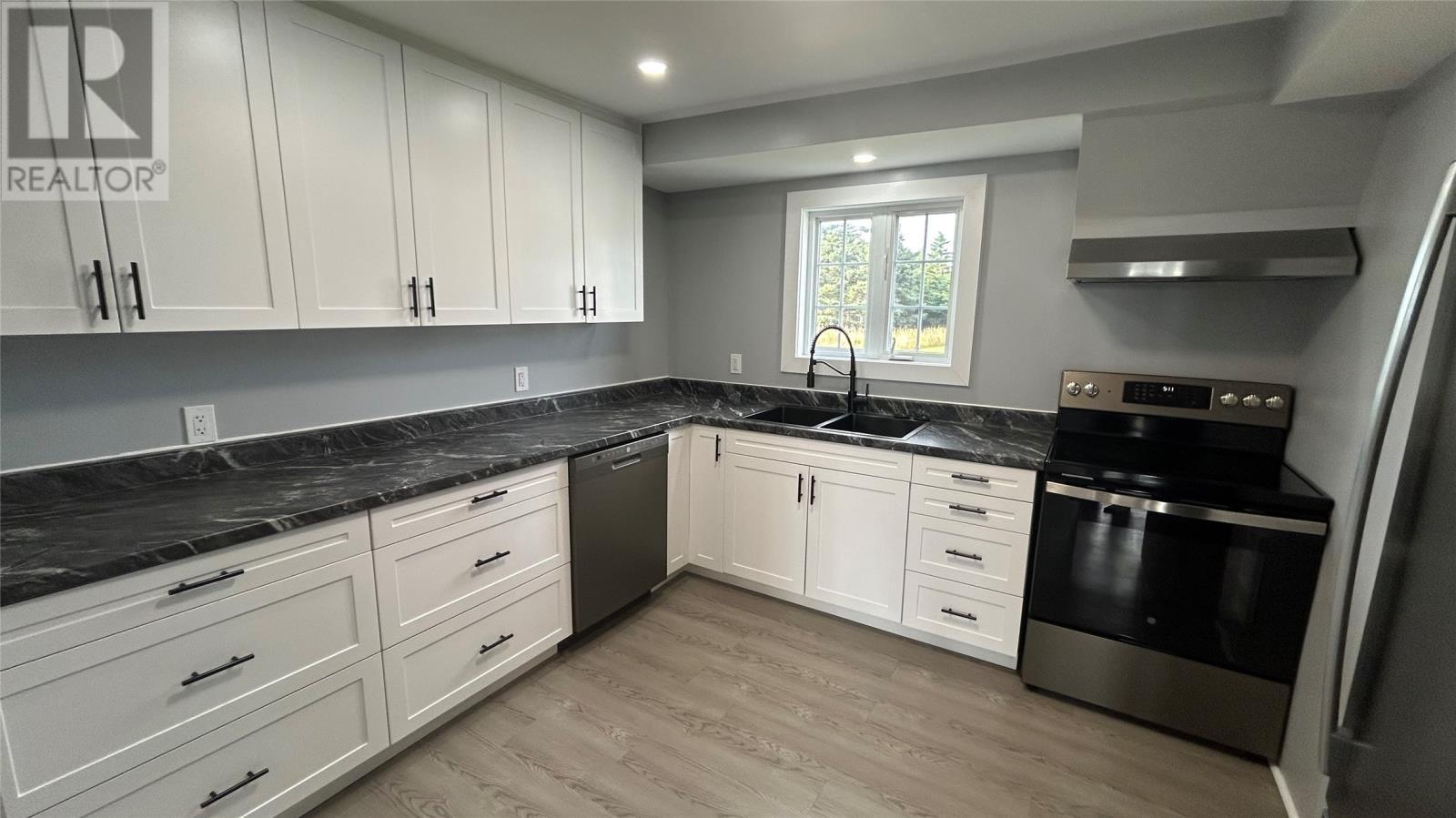 4 Spruce Drive, Port Au Port East, NL - Indoor Photo Showing Kitchen With Double Sink