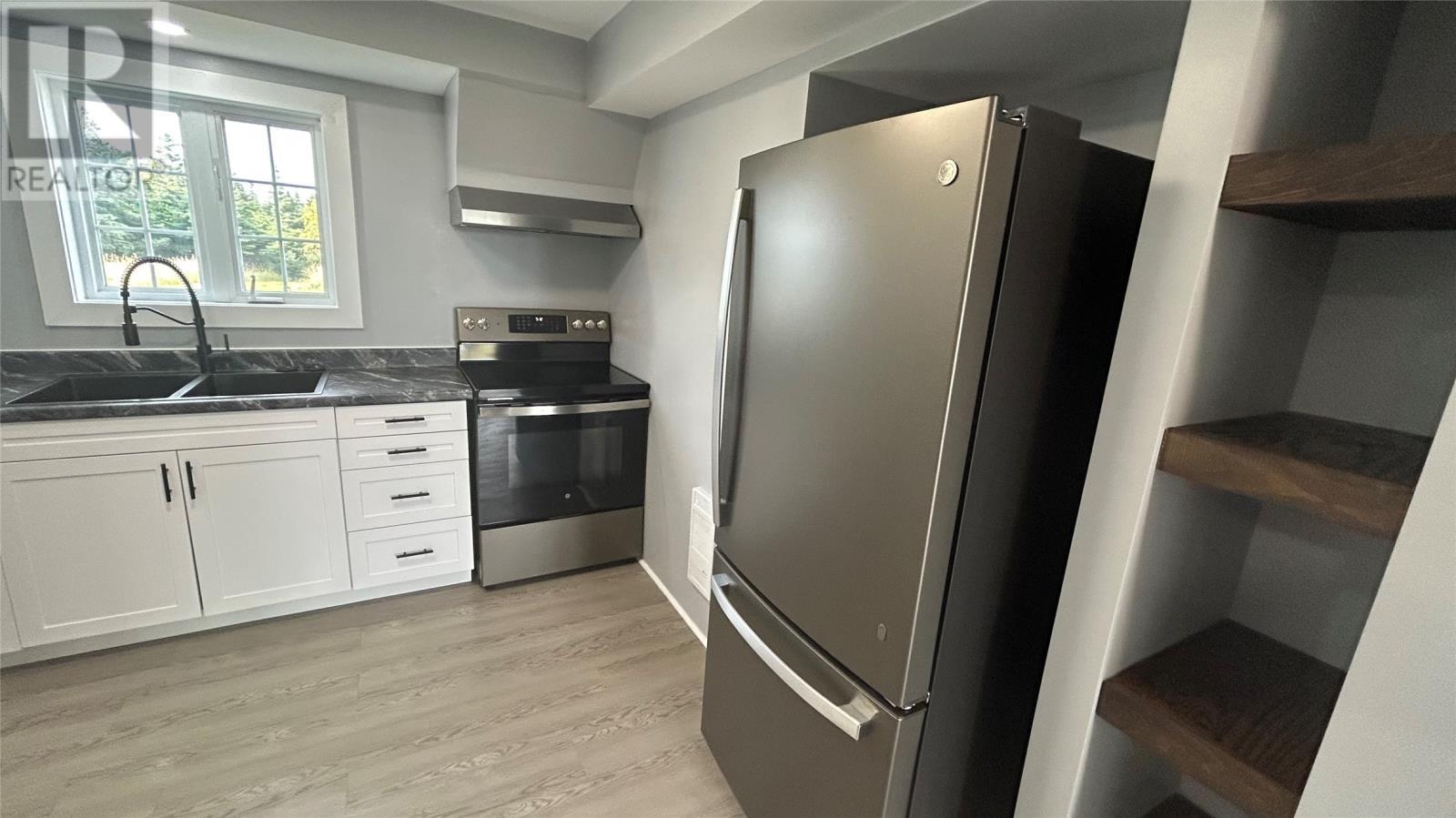 4 Spruce Drive, Port Au Port East, NL - Indoor Photo Showing Kitchen With Double Sink With Upgraded Kitchen