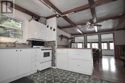 Kitchen Incl Breakfast Bar overlooks Livingroom -