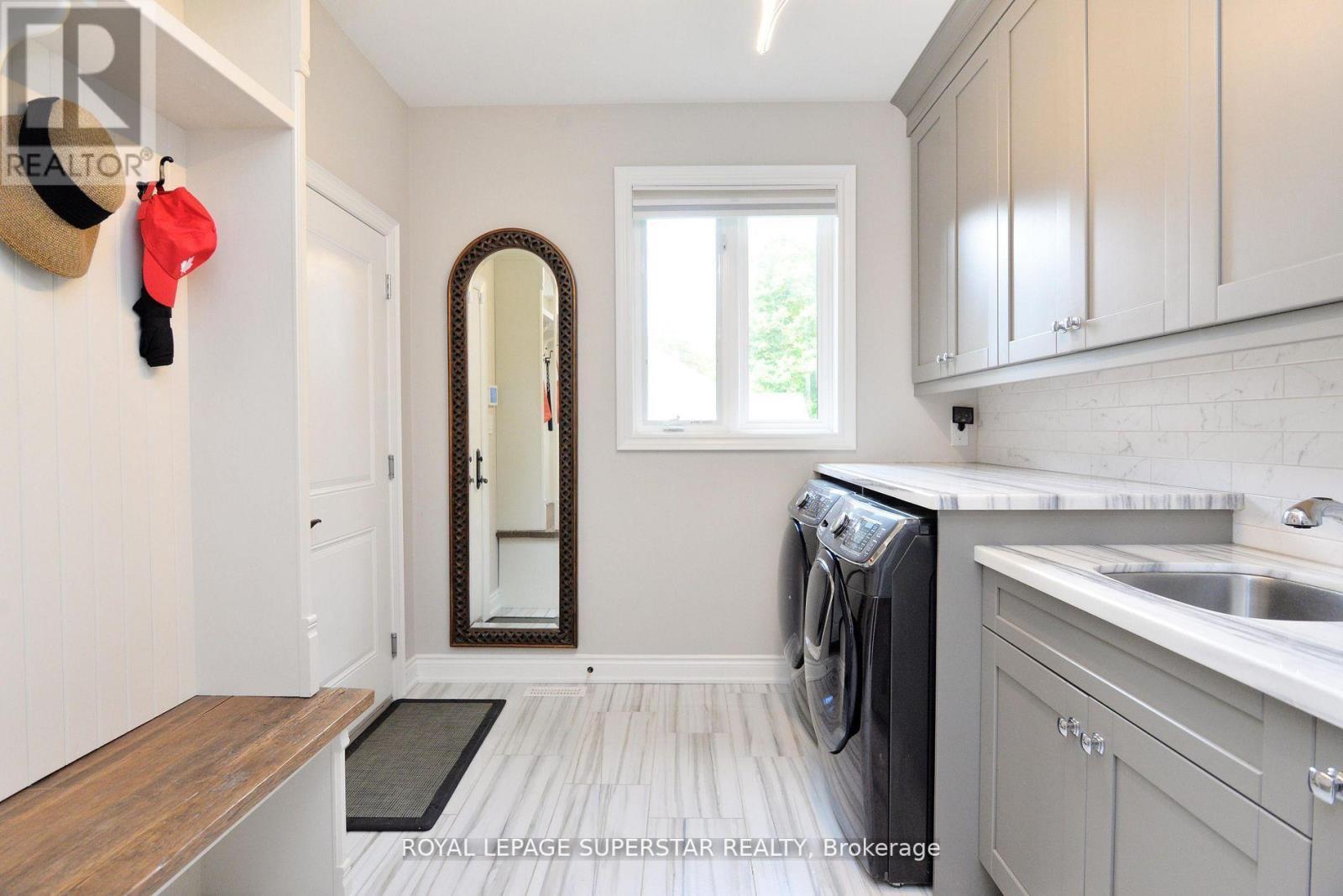 9 Black Creek Trail, Springwater, ON - Indoor Photo Showing Laundry Room