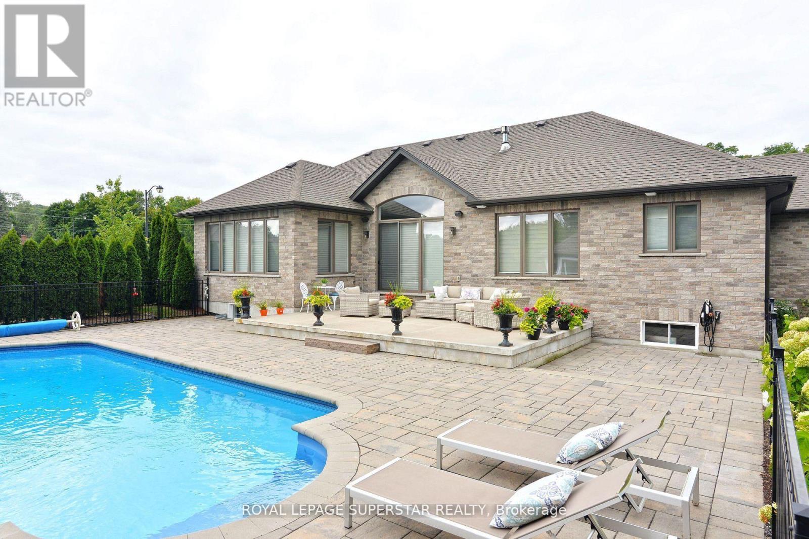 9 Black Creek Trail, Springwater, ON - Outdoor With In Ground Pool