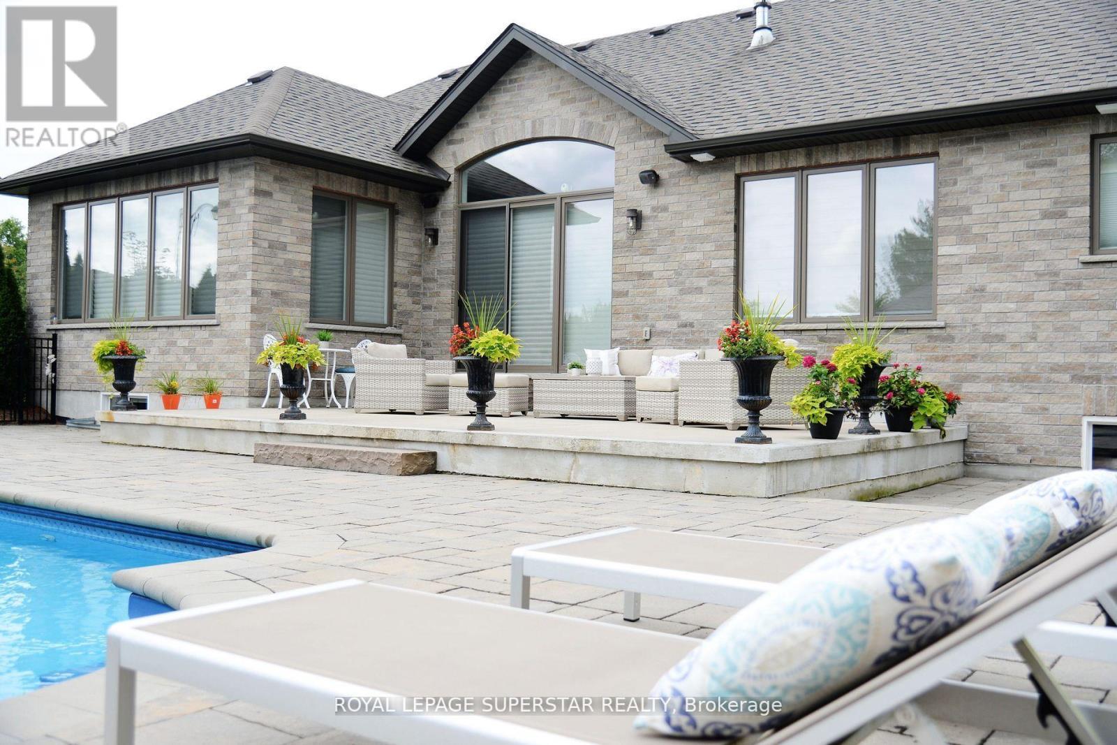 9 Black Creek Trail, Springwater, ON - Outdoor With In Ground Pool