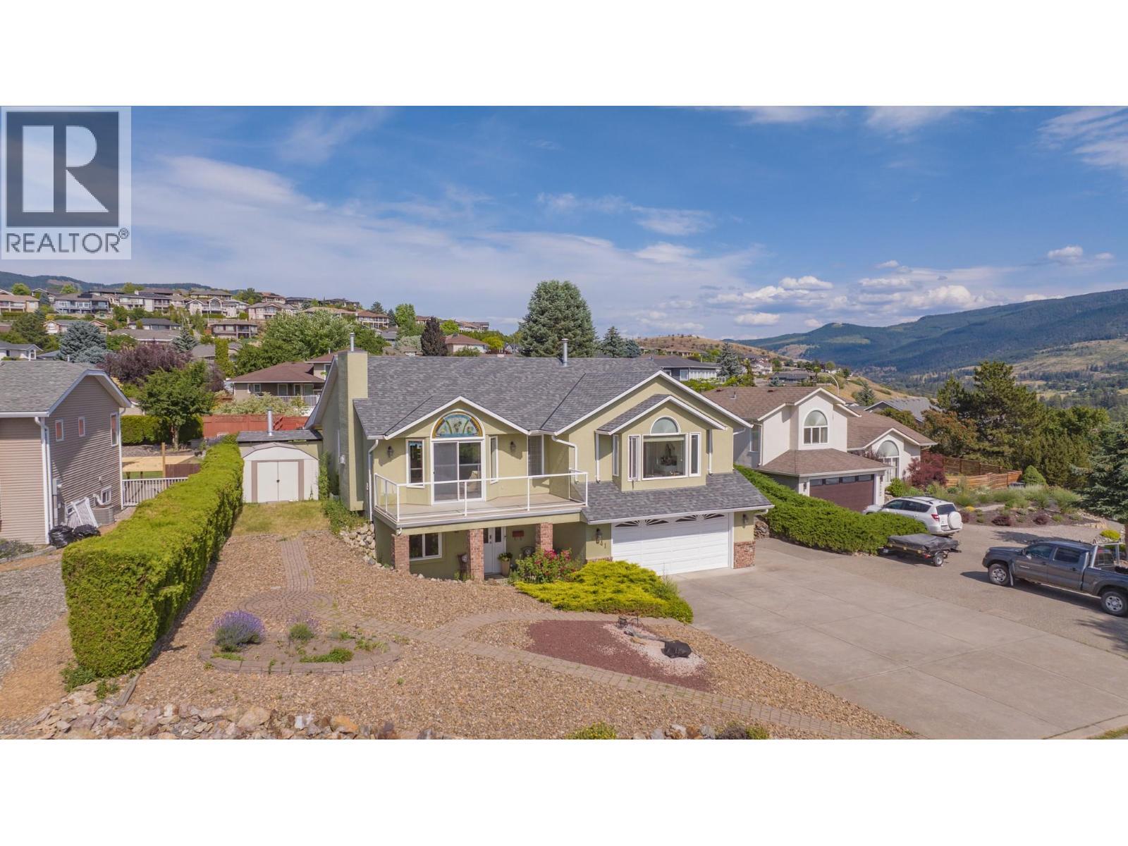 8841 Michael Drive, Coldstream, BC - Outdoor With Facade
