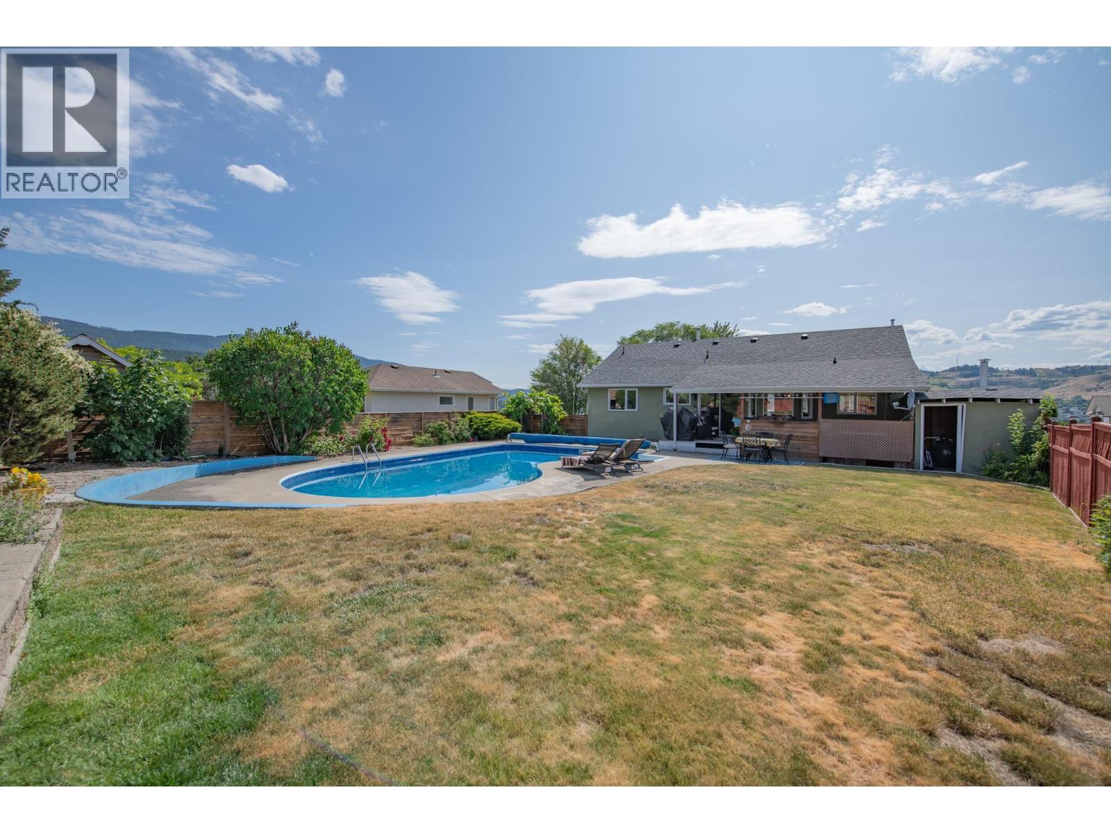 8841 Michael Drive, Coldstream, BC - Outdoor With In Ground Pool With Backyard