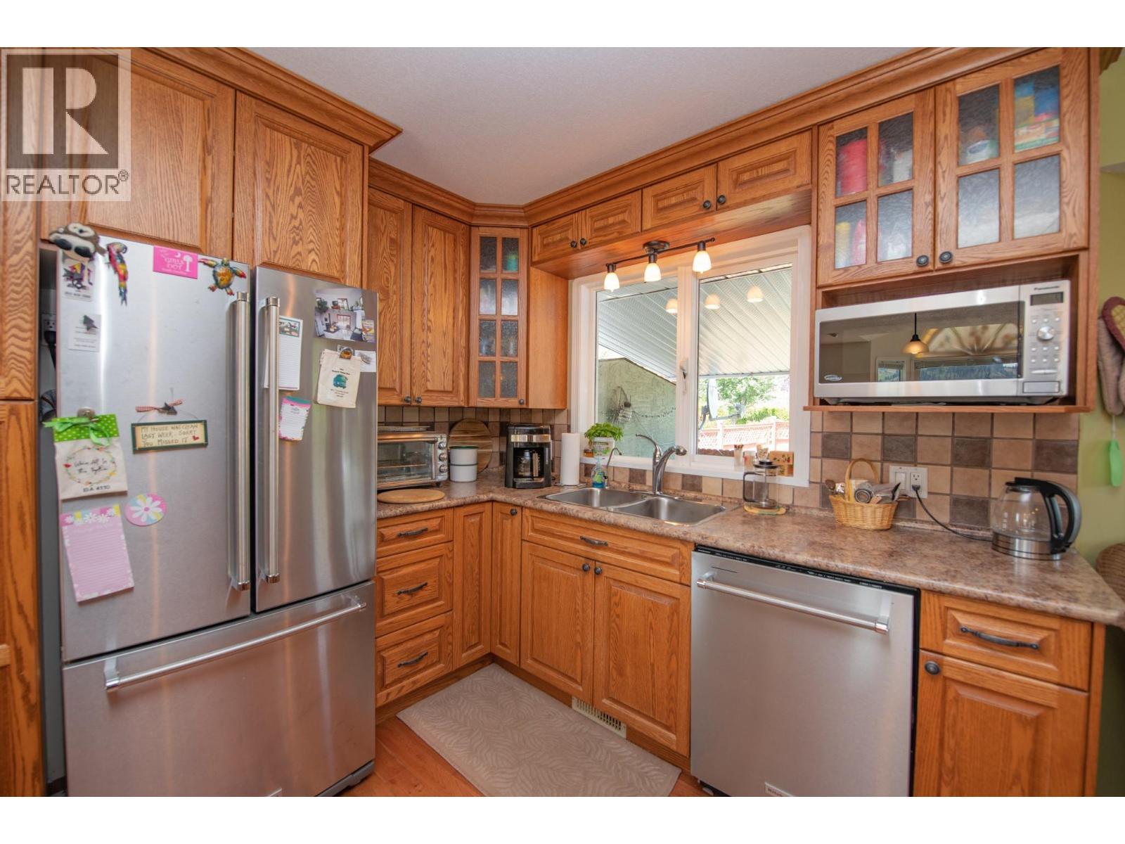 8841 Michael Drive, Coldstream, BC - Indoor Photo Showing Kitchen With Double Sink