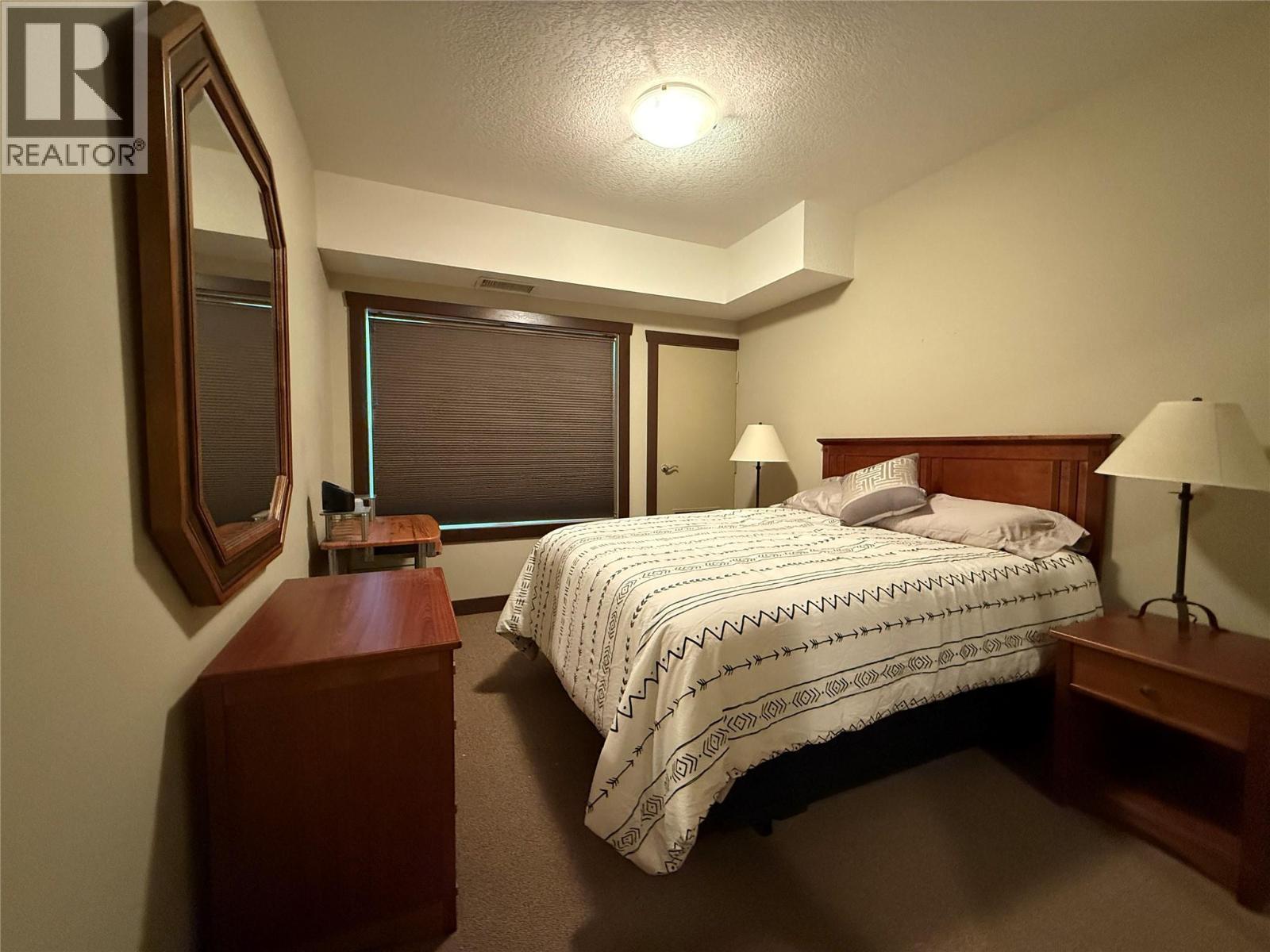 1500 Mcdonald Avenue Unit# 203, Fernie, BC - Indoor Photo Showing Bedroom
