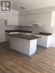 16 Dunes D Drive, Wasaga Beach, ON - Indoor Photo Showing Kitchen With Double Sink