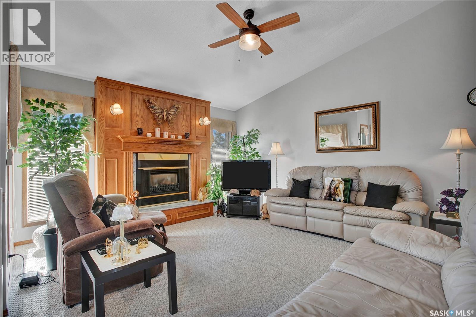 302 6Th Street, Hague, SK - Indoor Photo Showing Living Room With Fireplace