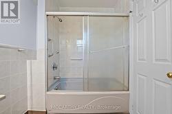 Bath and shower with sliding doors -