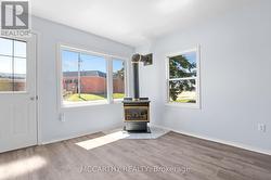 Gas Fireplace and large windows -