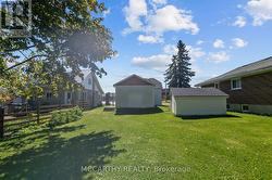 back of house view with garden shed -