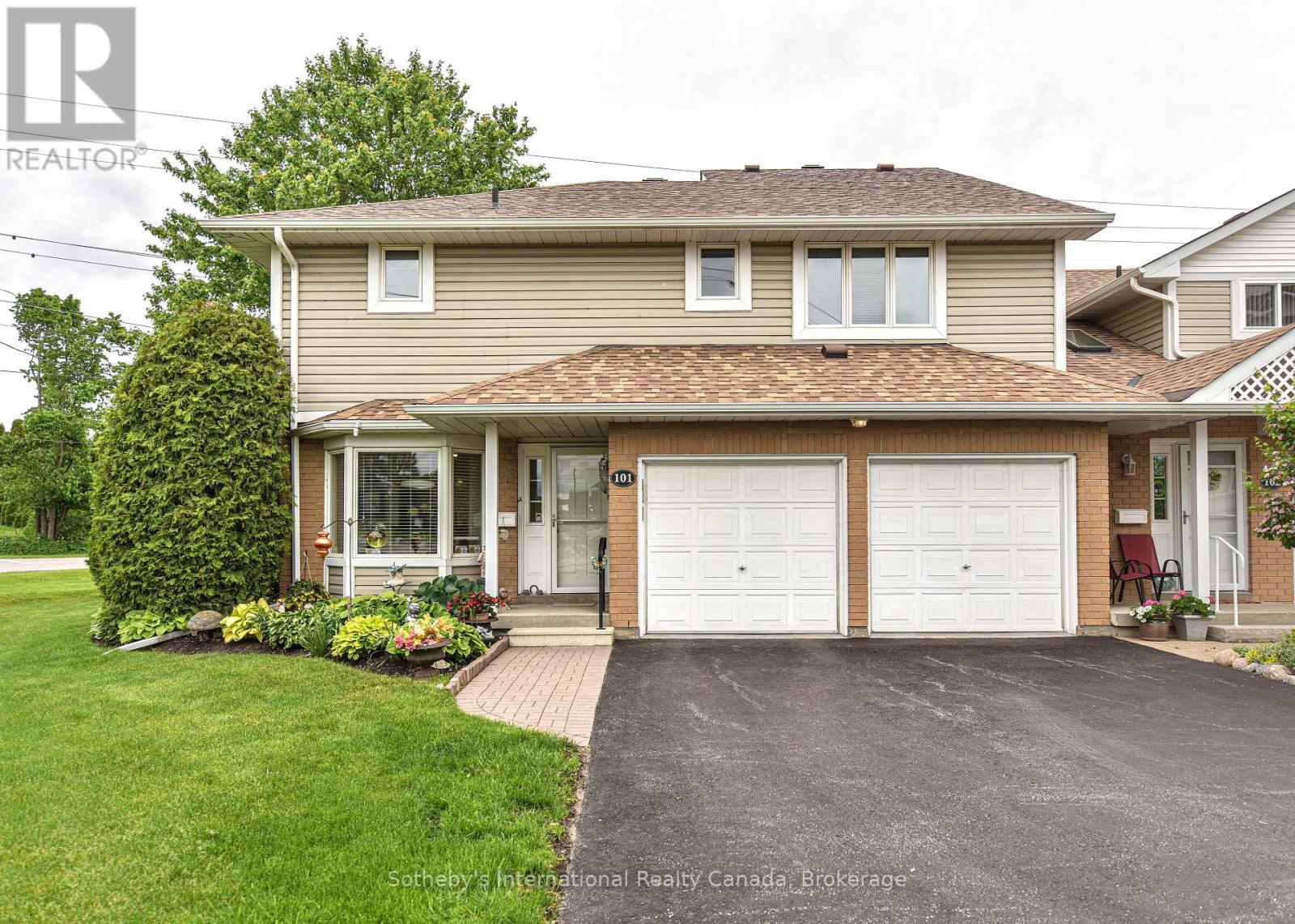 Double Car garage - 101 - 10 Museum Drive, Orillia, ON - Outdoor With Facade