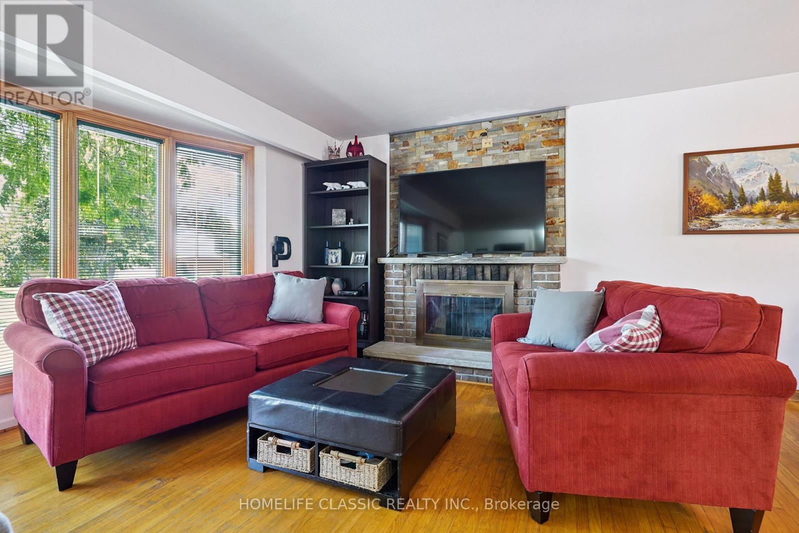 67 Beaver Bend Crescent, Toronto, ON - Indoor Photo Showing Living Room With Fireplace