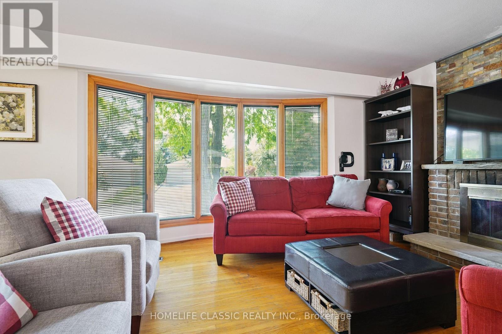 67 Beaver Bend Crescent, Toronto, ON - Indoor Photo Showing Living Room With Fireplace