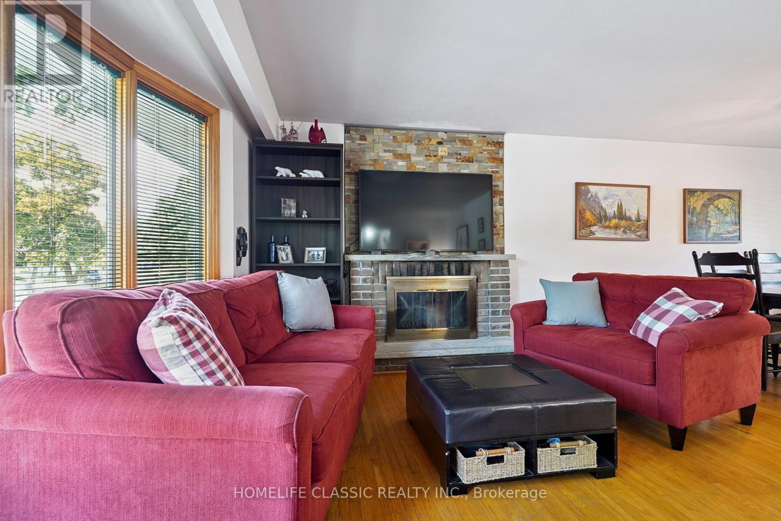 67 Beaver Bend Crescent, Toronto, ON - Indoor Photo Showing Living Room With Fireplace