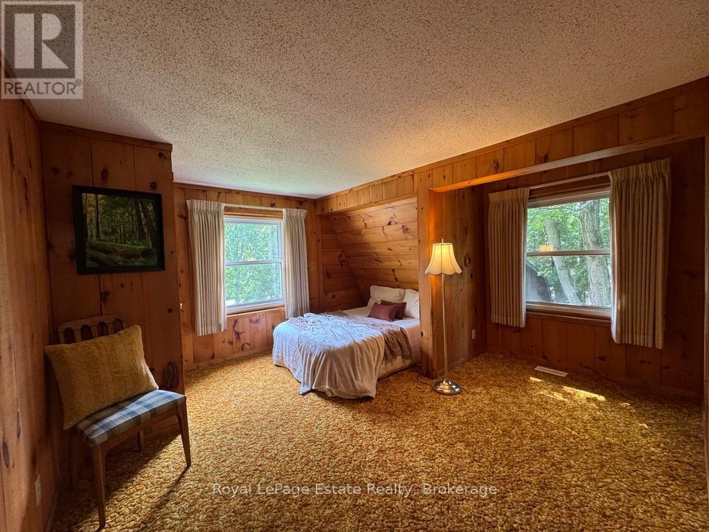 Bdrm 2 has room for Queen bed, 2 large windows - 44 Whitefish Boulevard, South Bruce Peninsula, ON - Indoor Photo Showing Bedroom