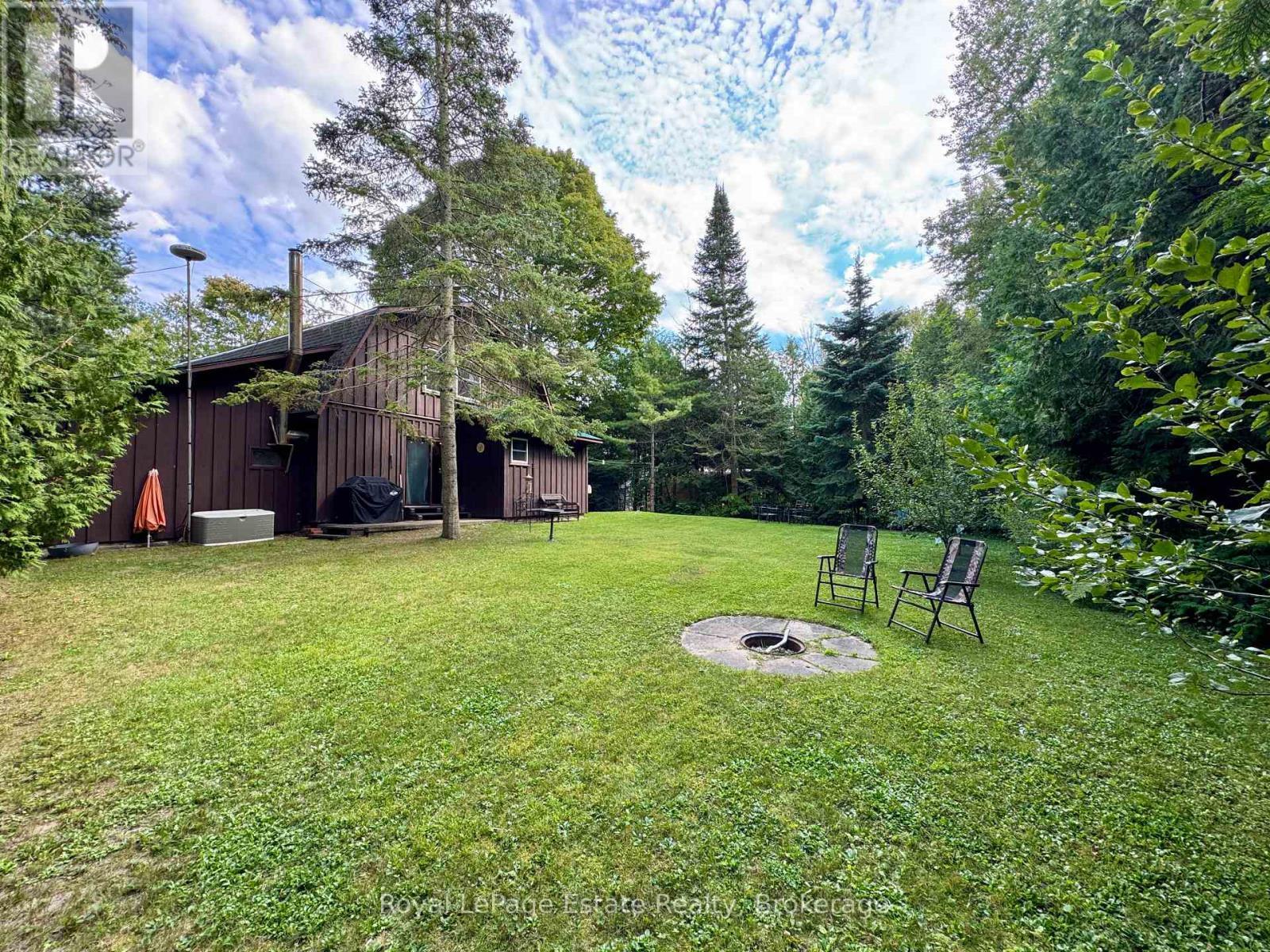 And open, backyard surrounded by trees - 44 Whitefish Boulevard, South Bruce Peninsula, ON - Outdoor