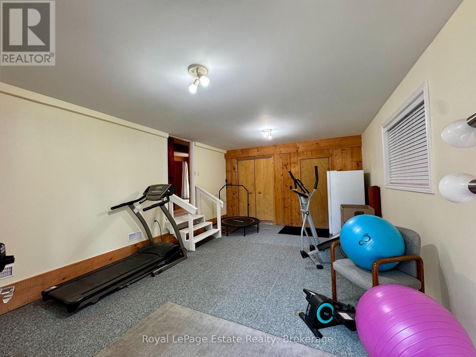Attached garage conversion to winterized space - 44 Whitefish Boulevard, South Bruce Peninsula, ON - Indoor Photo Showing Gym Room