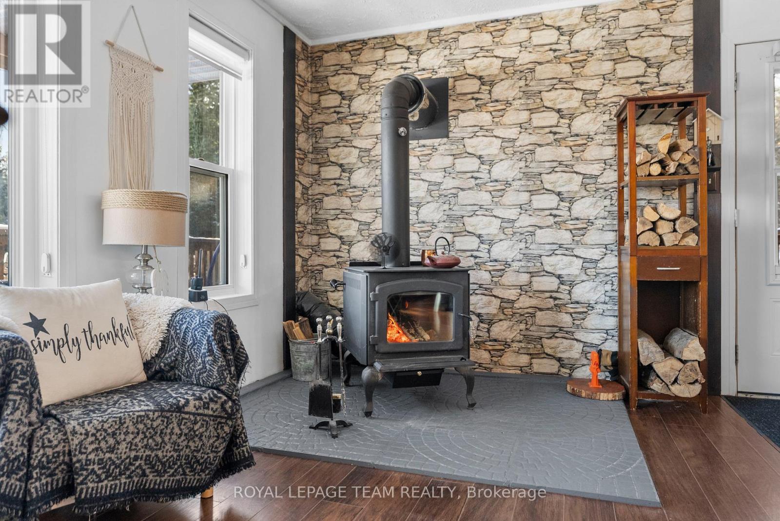 105 Heins Road, Brudenell, Lyndoch And Raglan, ON - Indoor Photo Showing Living Room With Fireplace
