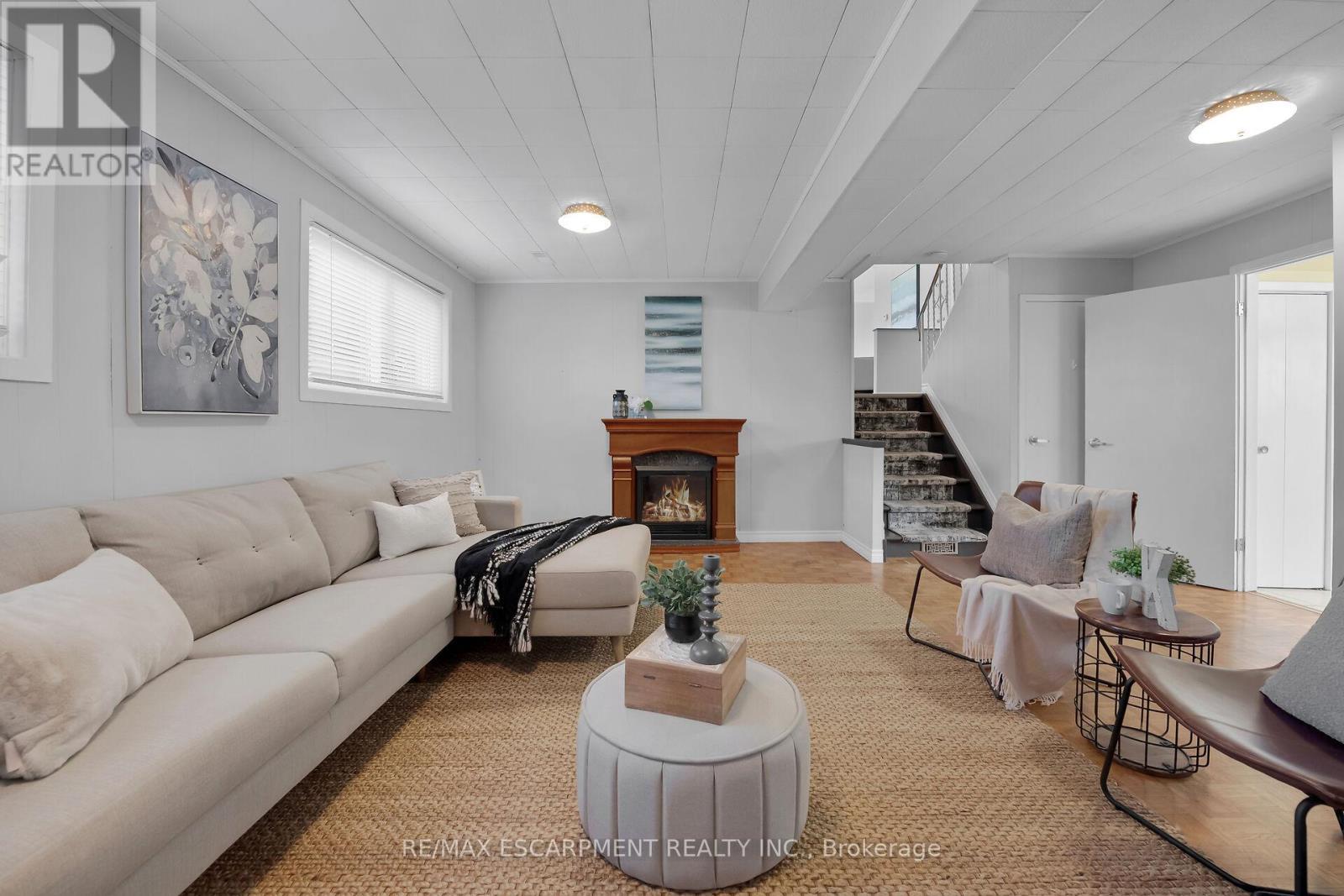 944 & 994 #8 Highway, Hamilton, ON - Indoor Photo Showing Living Room With Fireplace