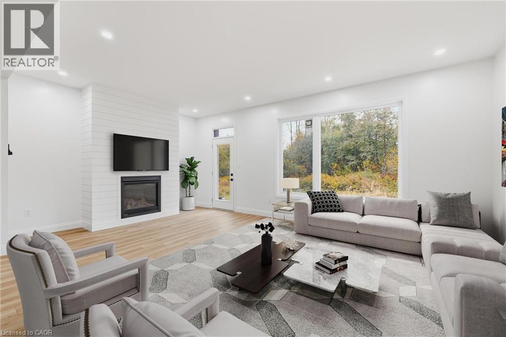 139 Pugh Street, Milverton, ON - Indoor Photo Showing Living Room With Fireplace