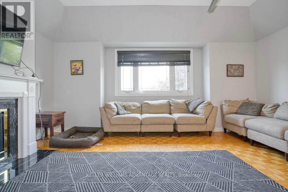 Upper - 71 Song Bird Drive, Markham, ON - Indoor Photo Showing Living Room With Fireplace