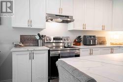 Kitchen offers plenty of counter space too -