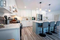 With a convenient island. Perfect for breakfast -