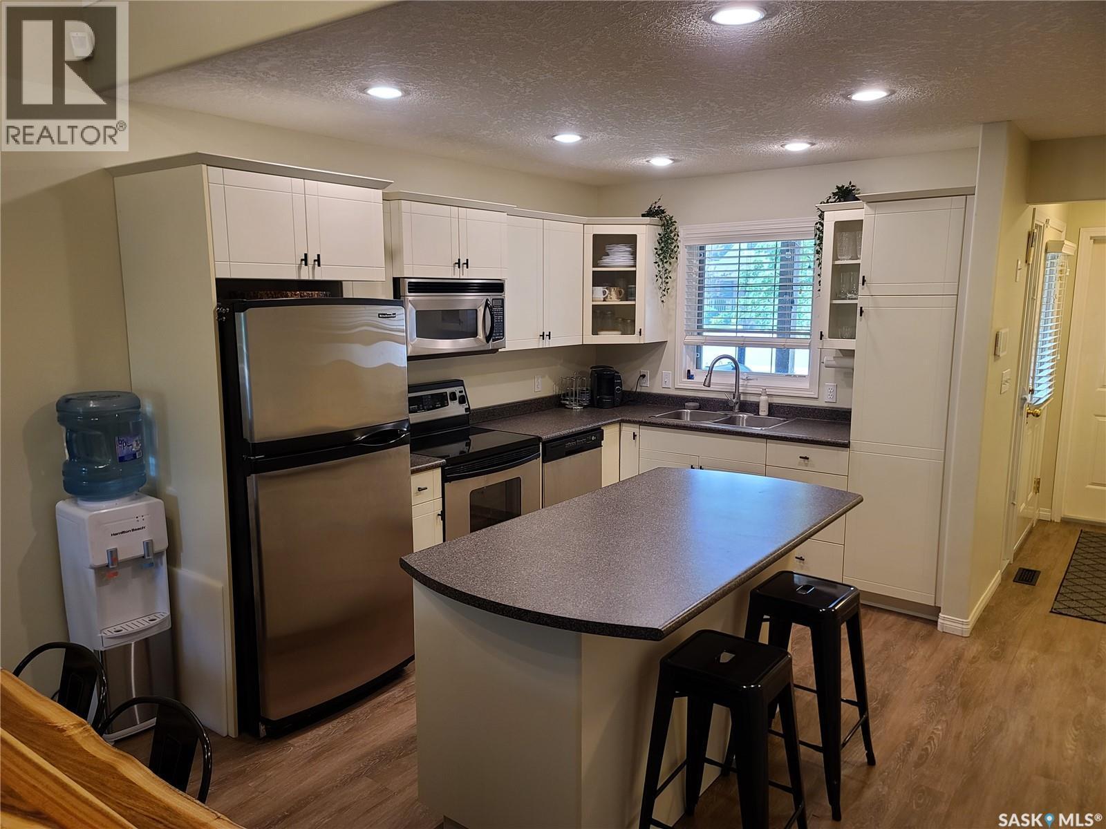 6 Eagle View Way, Elk Ridge, SK - Indoor Photo Showing Kitchen With Double Sink