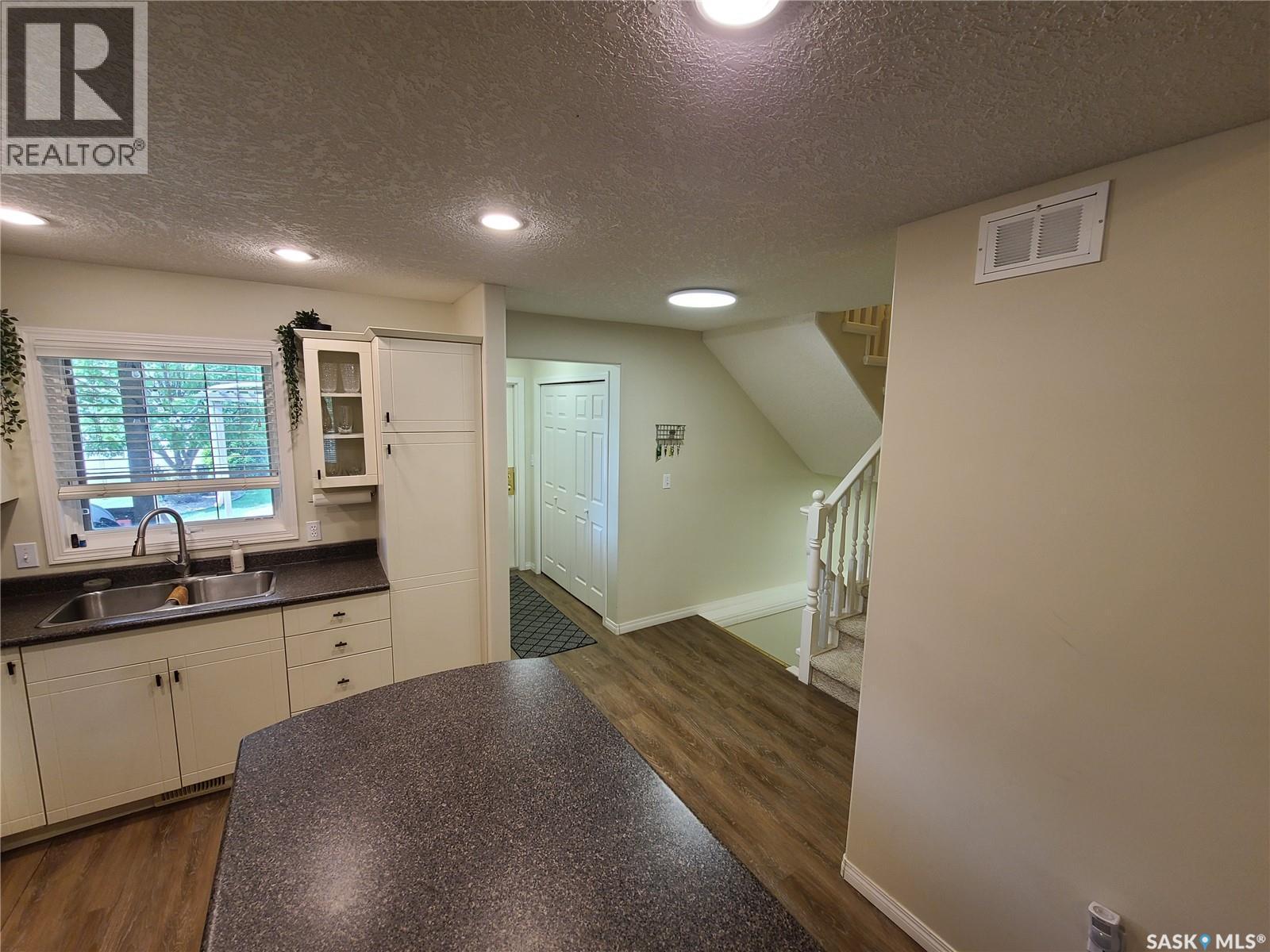 6 Eagle View Way, Elk Ridge, SK - Indoor Photo Showing Kitchen With Double Sink