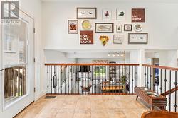 View from Kitchen to lower level family room -