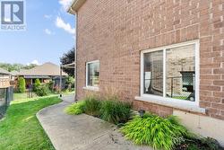 Side walkway to fenced yard -