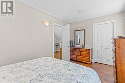 Primary bedroom with Partial waterviews. -