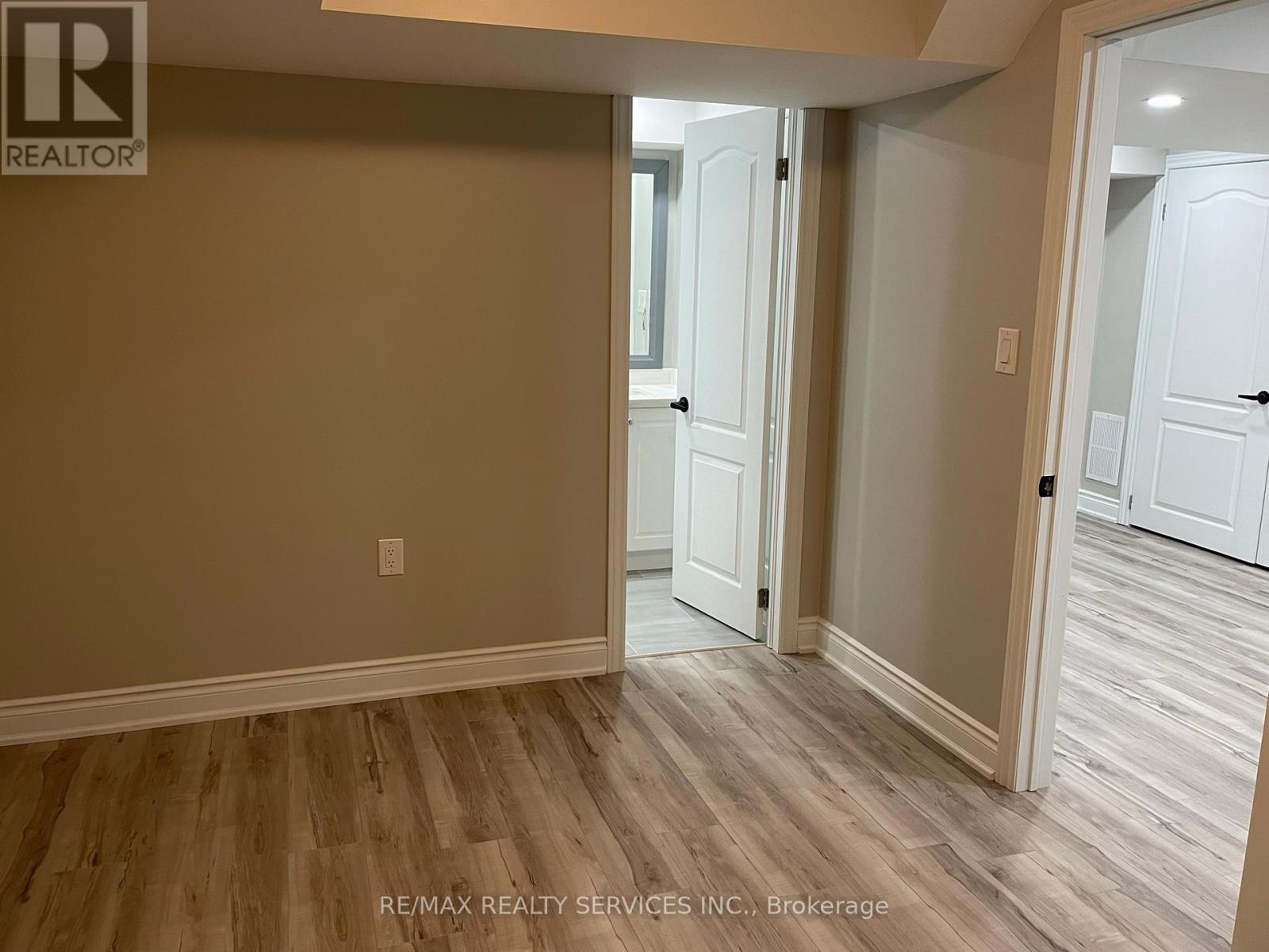 PRIMARY ROOM WITH SEMI ENSUITE BATH - 34 Ebury (Lower) Drive, Brampton, ON - Indoor Photo Showing Other Room