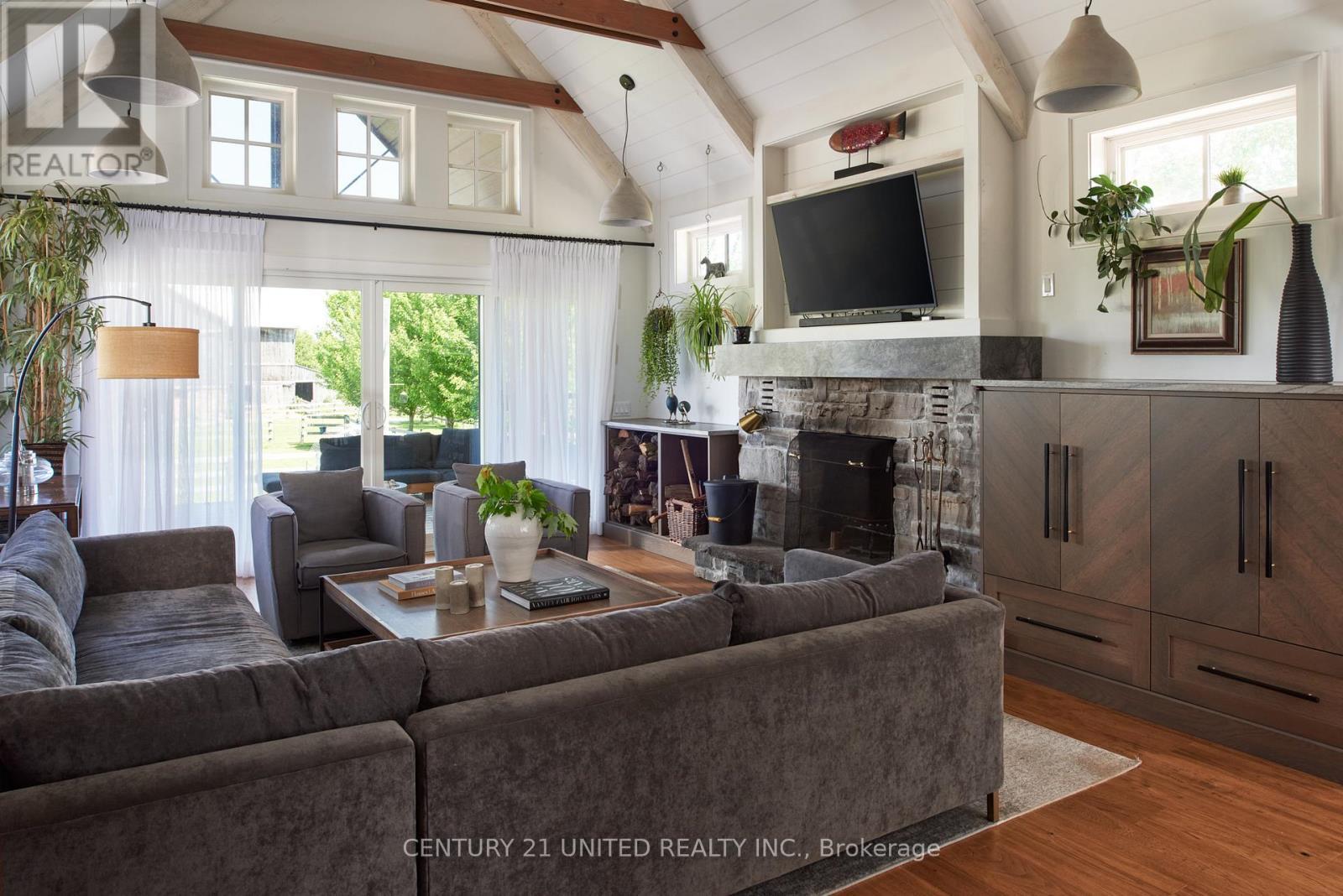 1662 11Th Line, Selwyn, ON - Indoor Photo Showing Living Room With Fireplace