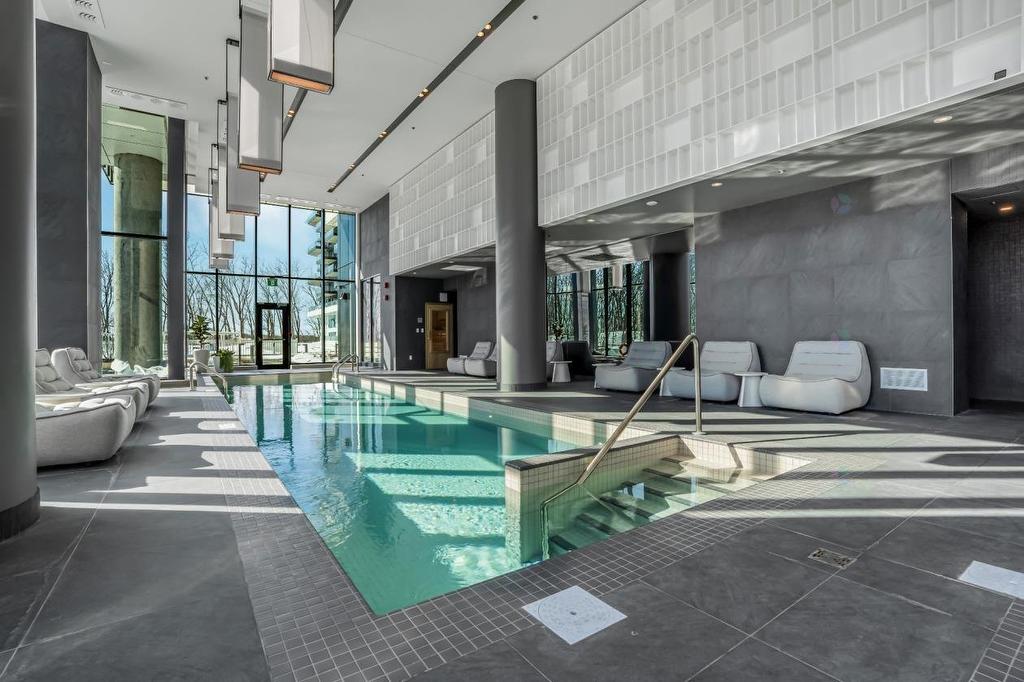 Piscine - 302-1000 Rue André-Prévost, Montréal (Verdun/Île-Des-Soeurs), QC - Indoor Photo Showing Other Room With In Ground Pool