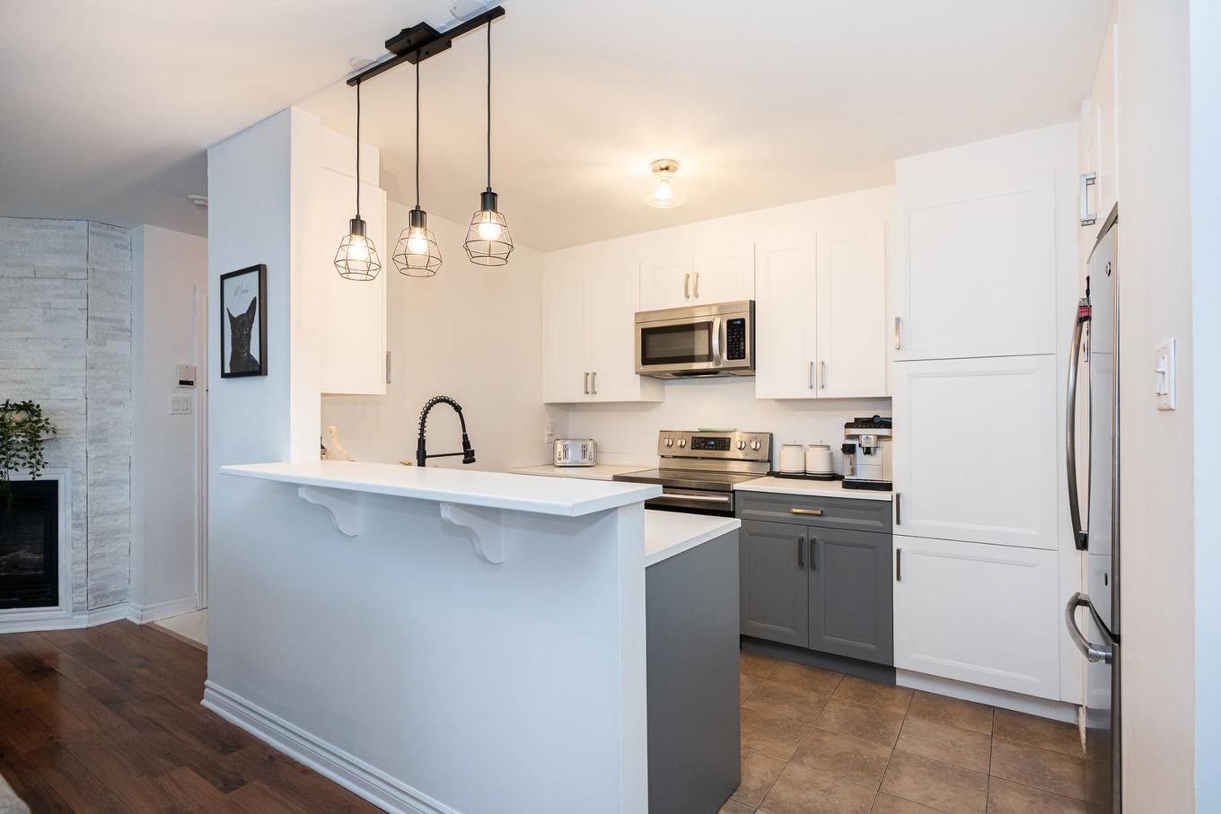 Cuisine - 304-5241 Av. Eliot, Laval (Chomedey), QC - Indoor Photo Showing Kitchen With Upgraded Kitchen