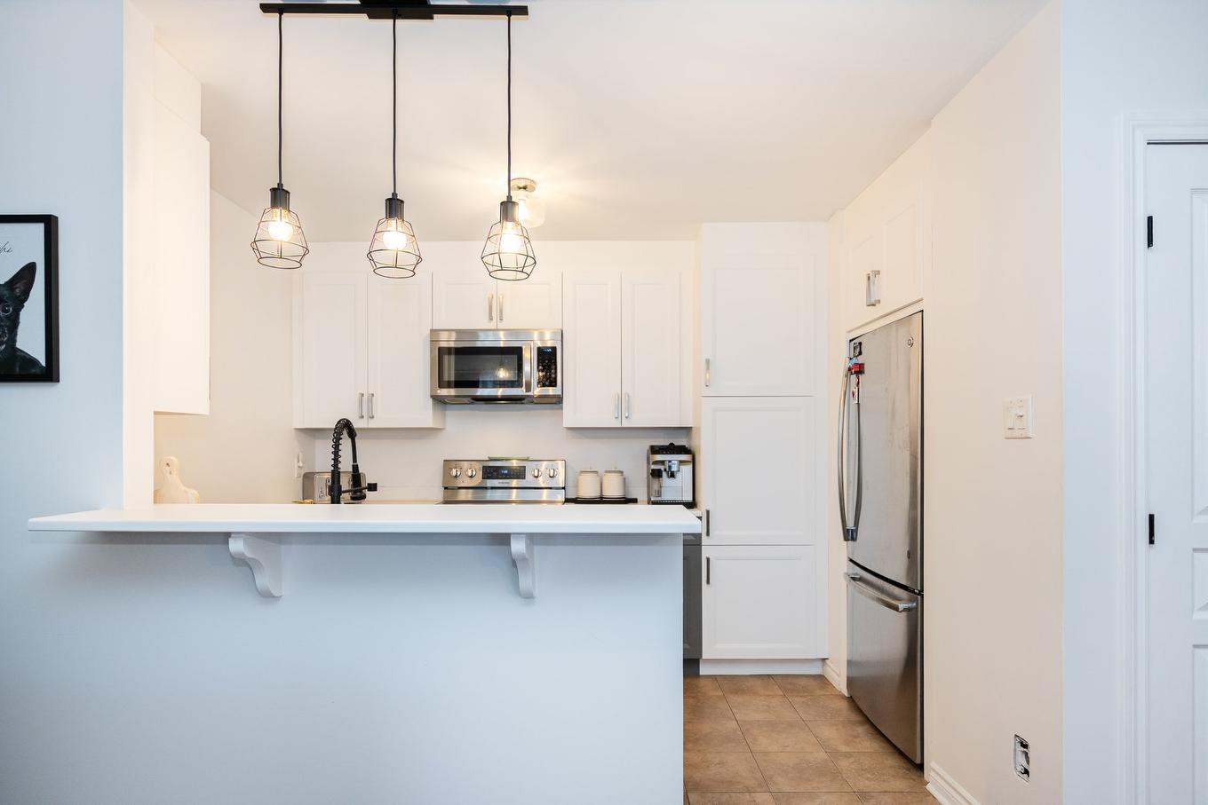 Cuisine - 304-5241 Av. Eliot, Laval (Chomedey), QC - Indoor Photo Showing Kitchen With Upgraded Kitchen