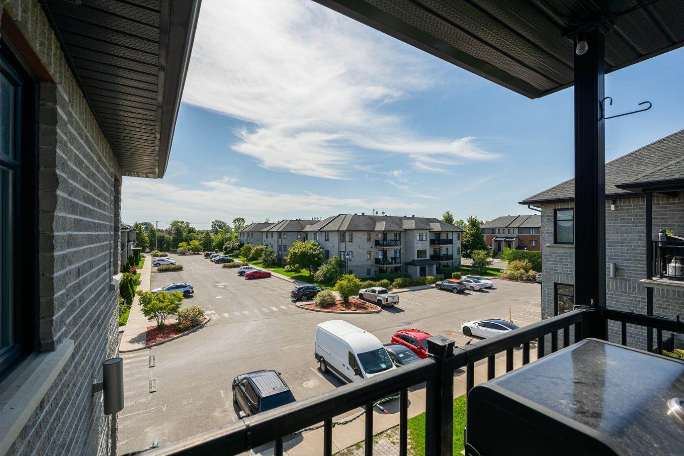 Vue - 304-5241 Av. Eliot, Laval (Chomedey), QC - Outdoor With Exterior