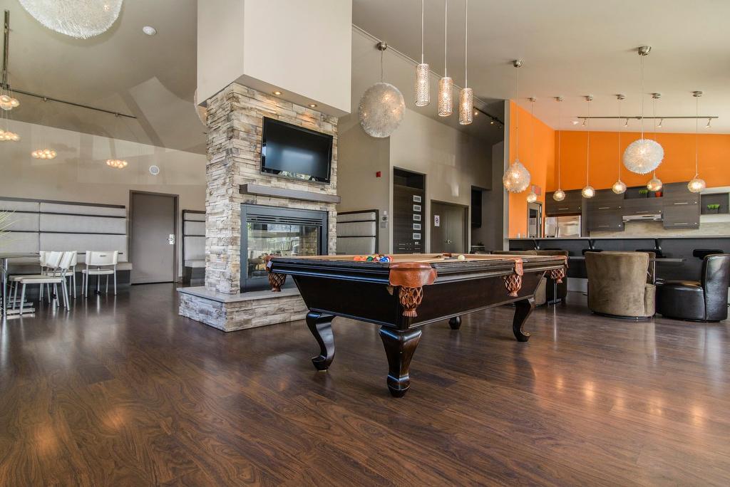 Salle communautaire - 304-5241 Av. Eliot, Laval (Chomedey), QC - Indoor With Fireplace